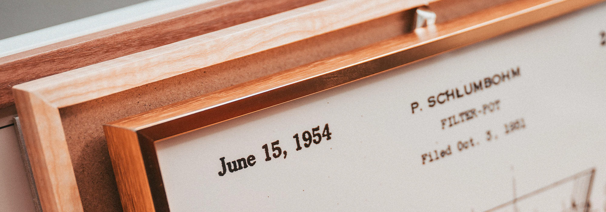 Premium poster frames in sleek aluminum or real wood, durable and stylish, ideal for displaying and protecting art or photos in any room