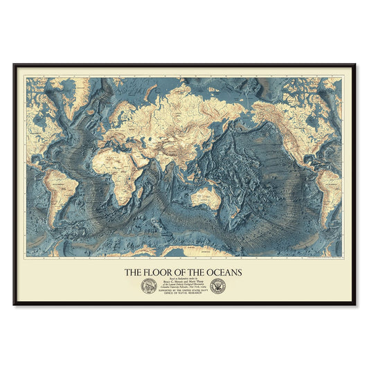 World map artwork showing ocean floors titled The Floor of the Oceans bathymetric map poster, with black aluminium frame on white background