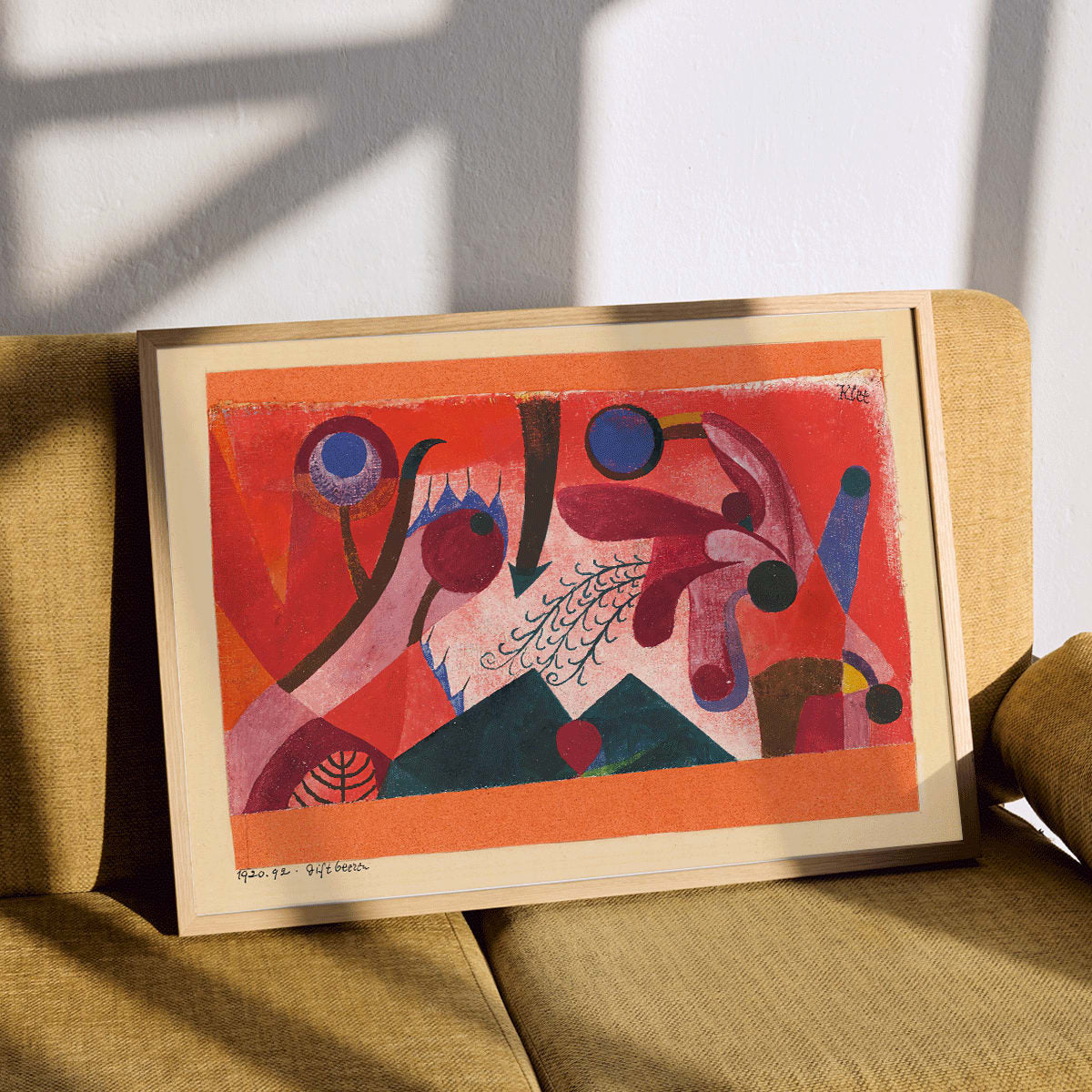 Vibrant abstract geometric art poster Poisonous Berries by Paul Klee featuring bold shapes and colors, framed and displayed in modern living room decor