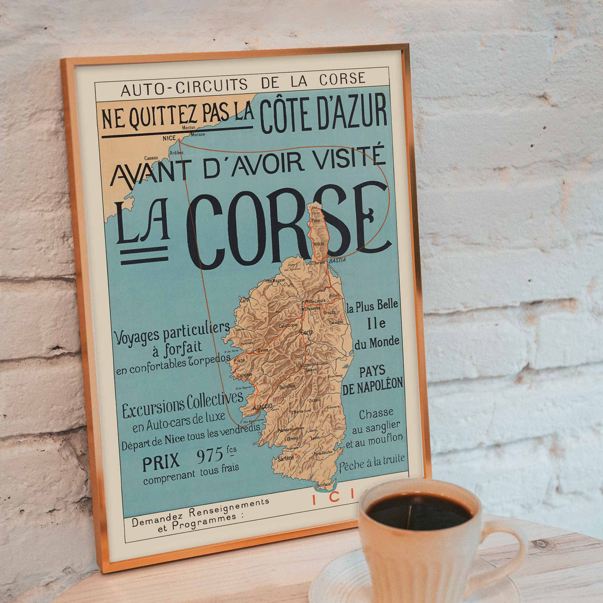Auto-Circuits de la Corse poster map of Corsica with touring routes and sea connections to Nice and Cannes, framed and displayed in modern living room decor