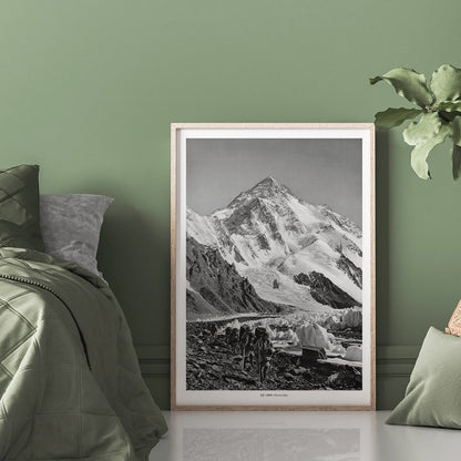 Black and white photo by Vittorio Sella of mountaineers trekking toward K2 over the Godwin Austen glacier titled Le pic K2 vue prise du glacier Godwin Austen, framed and displayed in home decor