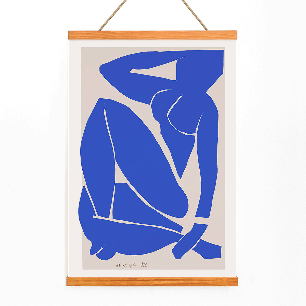 Nu Bleu III by Henri Matisse abstract blue figure on white background minimalist art poster, with wooden magnetic frame on white background