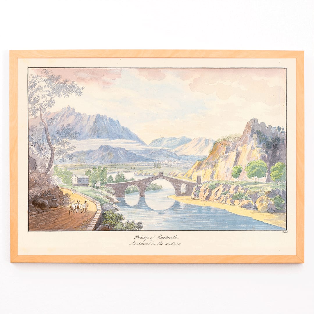Bridge of Martorelle by Charles Hamilton Smith stone bridge over river with mountains scenic landscape poster, framed and displayed in modern living room decor