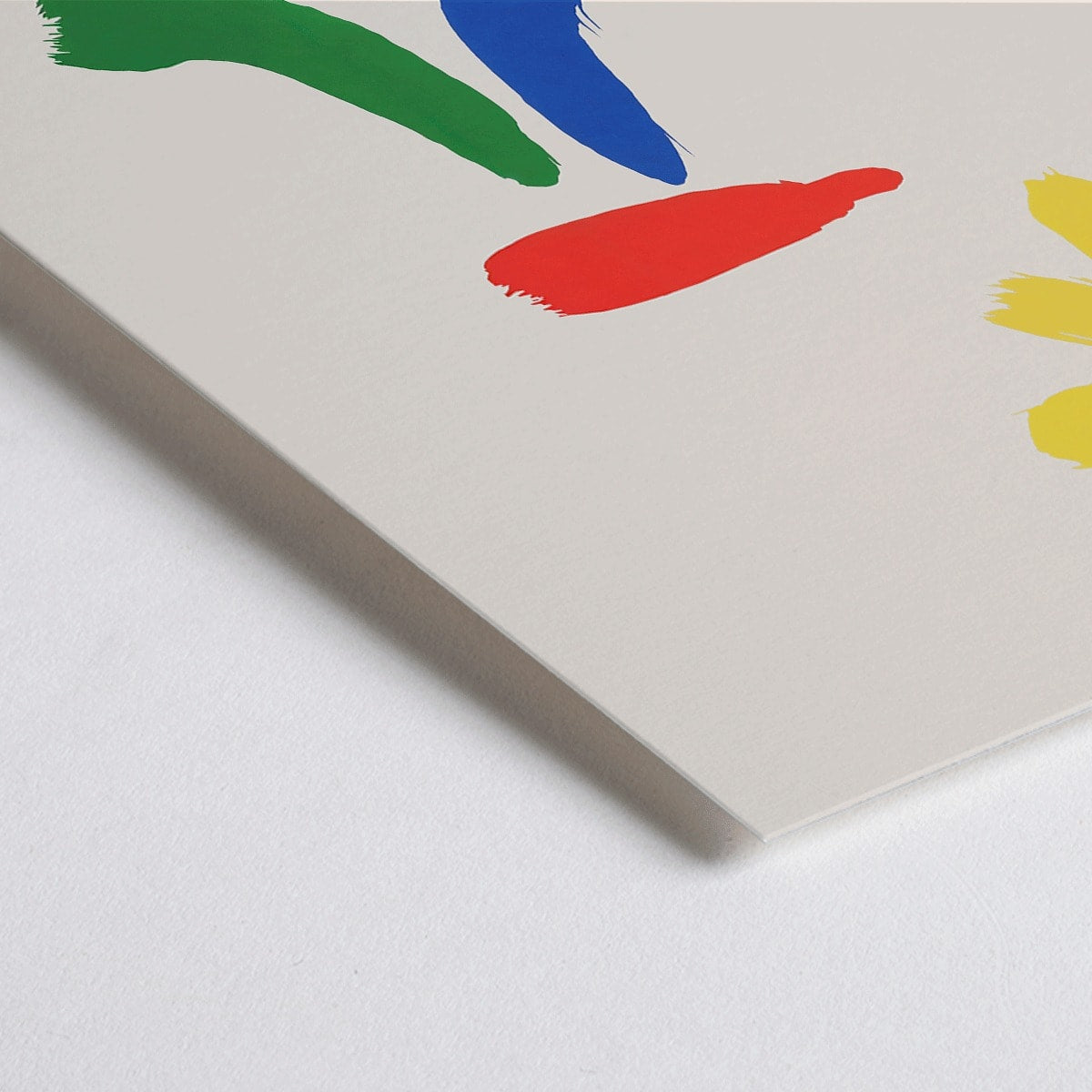 Closeup detail of Parler Seul exhibition poster by Joan Miro with abstract colorful shapes on a light background