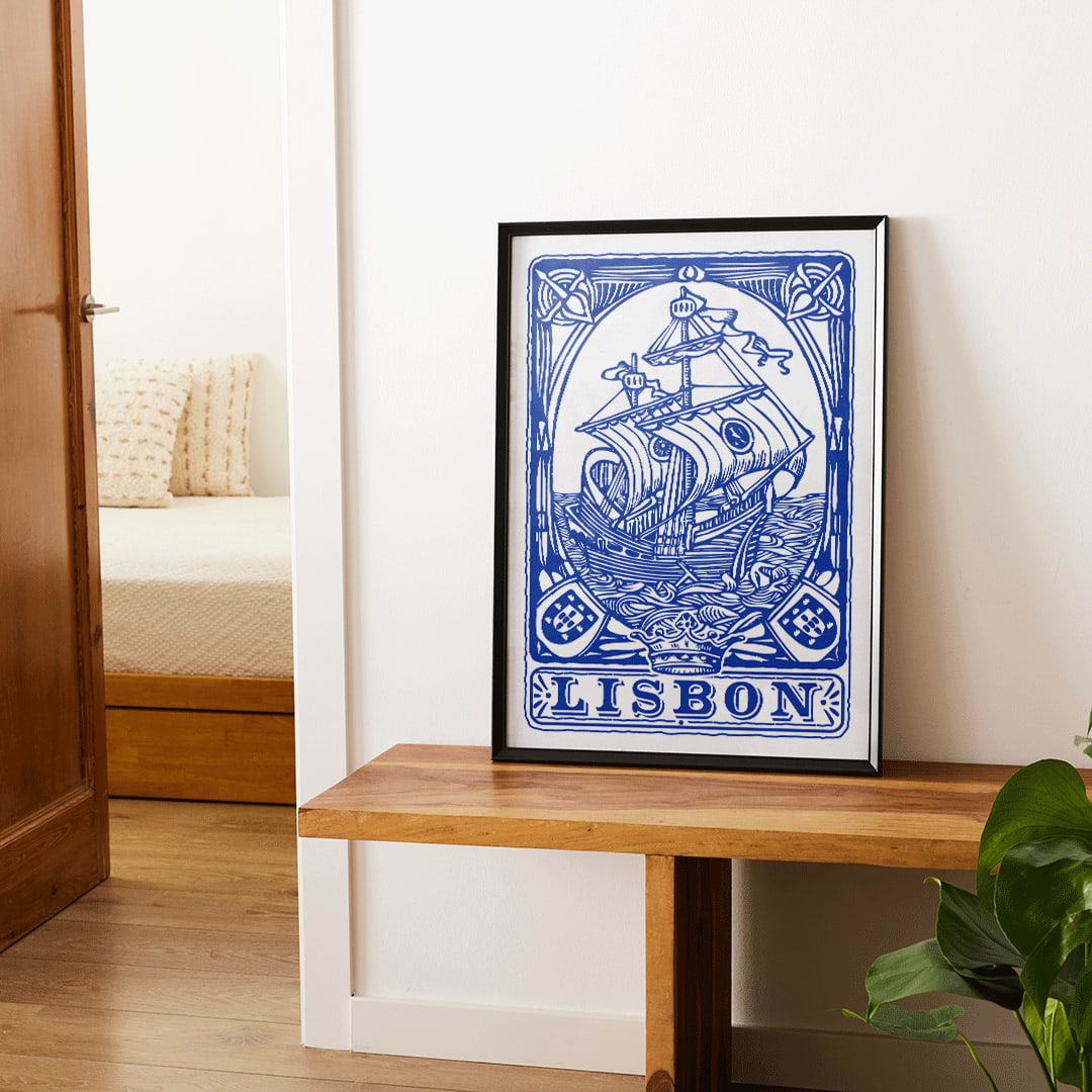 Blue painted azulejo tile artwork by Lisbon Azulejo featuring a ship and the word Lisbon Blue painted tile 1 poster, framed and displayed in home decor