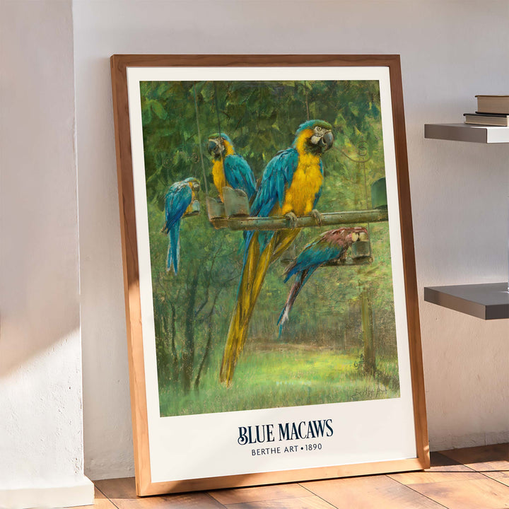 Colorful blue and yellow macaws perched in a lush green forest poster by Berthe Art, framed and displayed in home decor