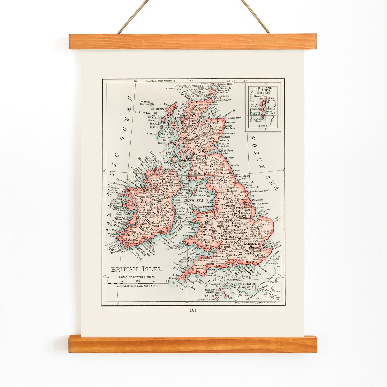 Vintage cartographic map of the British Isles from Universal Atlas of the World as detailed artwork poster, with wooden magnetic frame on white background