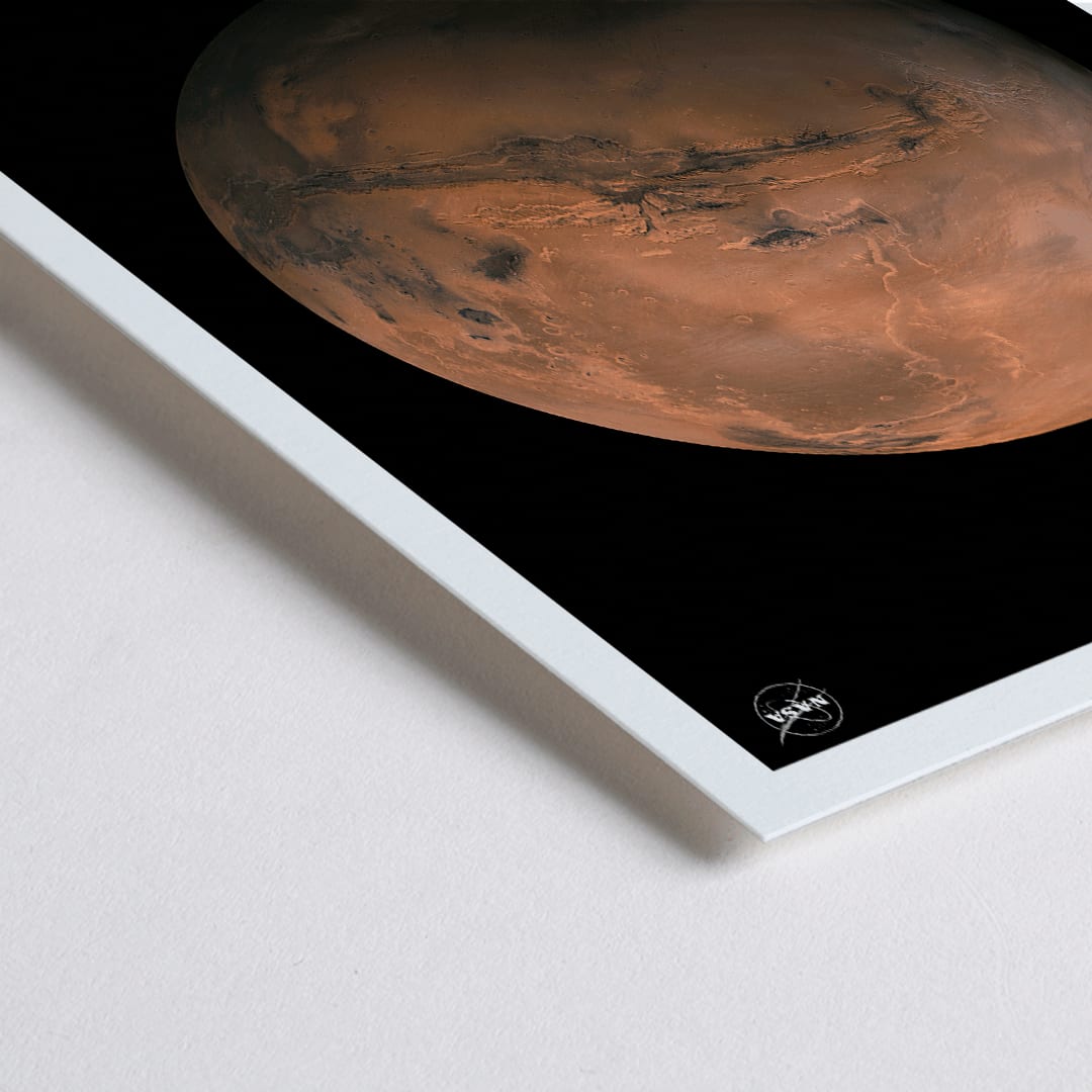 Closeup detail of Mars by NASA framed poster featuring a detailed photo of the red planet with the title Mars at the bottom on a black background