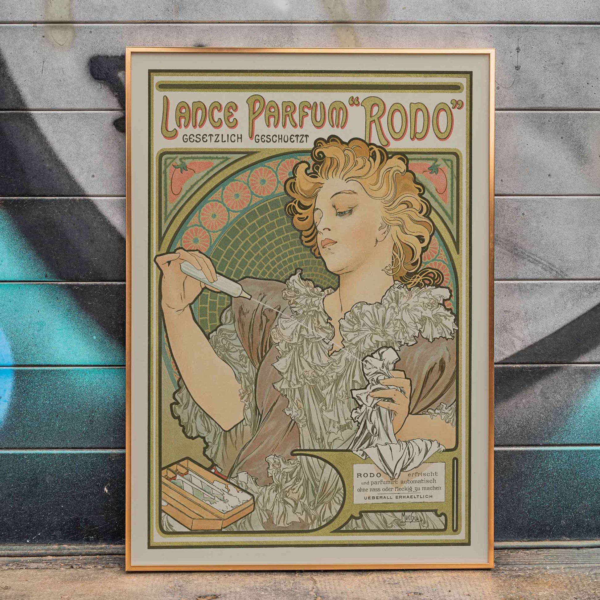 Alphonse Mucha Lance parfum Rodo poster Art Nouveau woman with flowing hair floral border soft green gold tones, framed and displayed in home decor