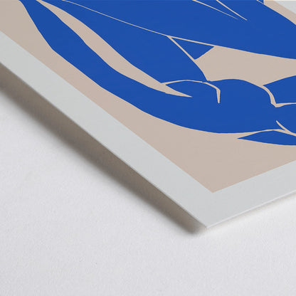 Closeup detail of Nu Bleu II by Henri Matisse blue abstract figure art print poster on beige background framed