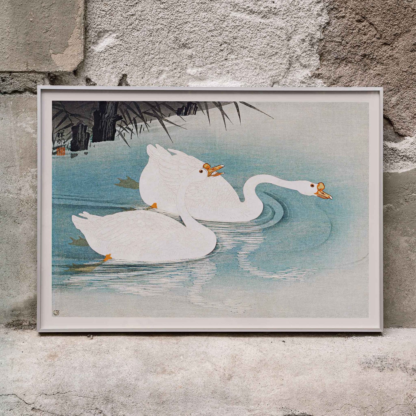 White geese swimming among blue water and reeds Geese amid Reeds by Ohara Koson poster, framed and displayed in modern living room decor