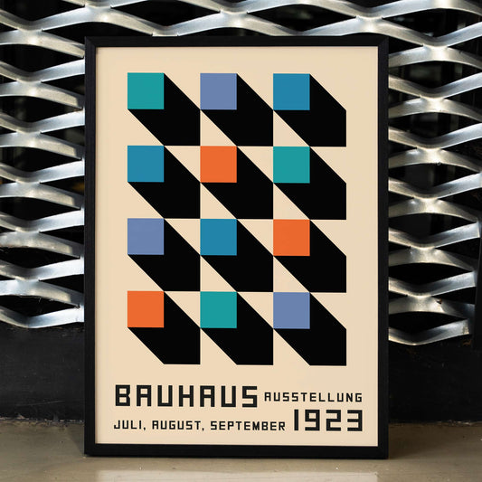 Bauhaus Poster inspired by the Weimar Exhibition with geometric patterns bold colors by Joost Schmidt in black blue orange and teal squares, framed and displayed in home decor