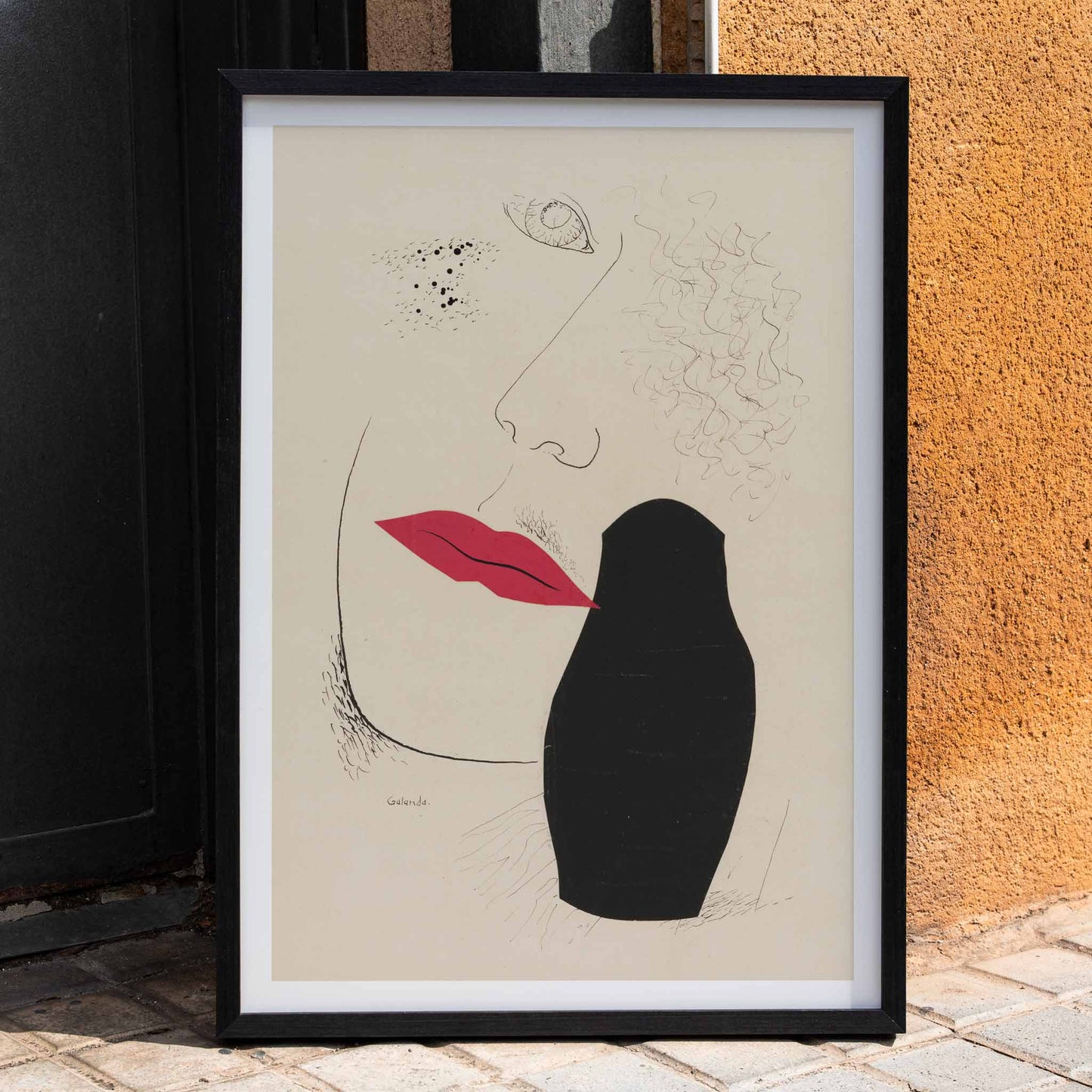 Abstract minimalist portrait with red lips and black silhouette modern art poster by Mikulas Galanda titled Desire, framed and displayed in home decor