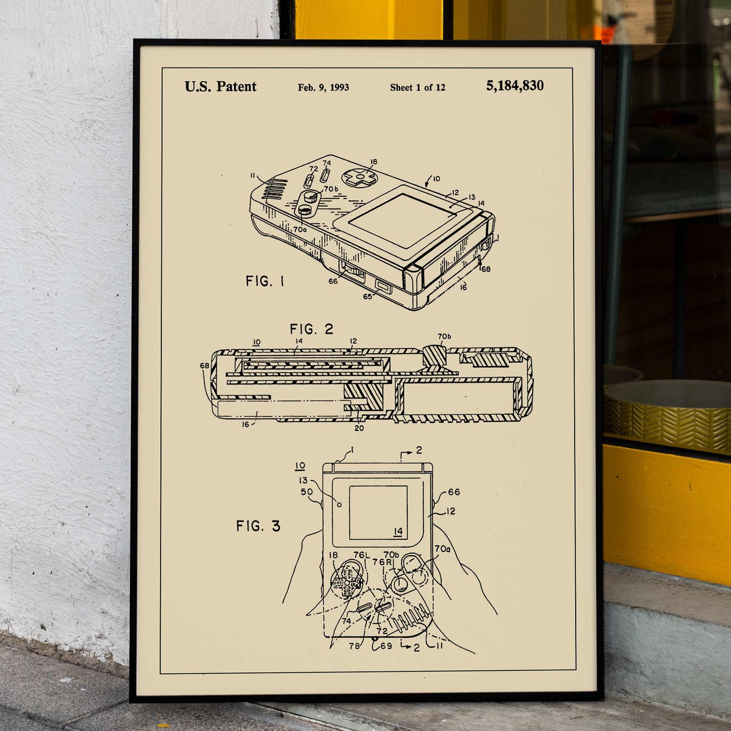 Gameboy Patent technical drawing and poster artwork by Nintendo ideal for gaming decor and collectors, framed and displayed in home decor