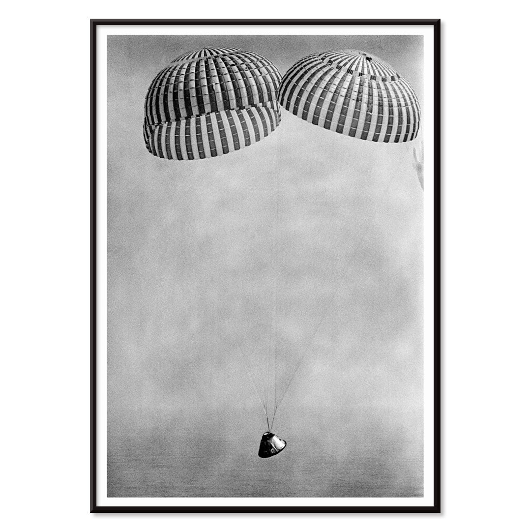 Apollo 9 spacecraft with astronauts McDivitt Scott and Schweickart descending toward Atlantic splashdown with parachutes NASA recovery poster, with black aluminium frame on white background