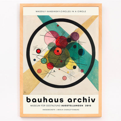 Wassily Kandinsky Circles in a Circle Bauhaus poster featuring abstract geometric shapes circles and lines for Bauhaus Archiv exhibition, framed and displayed in modern living room decor